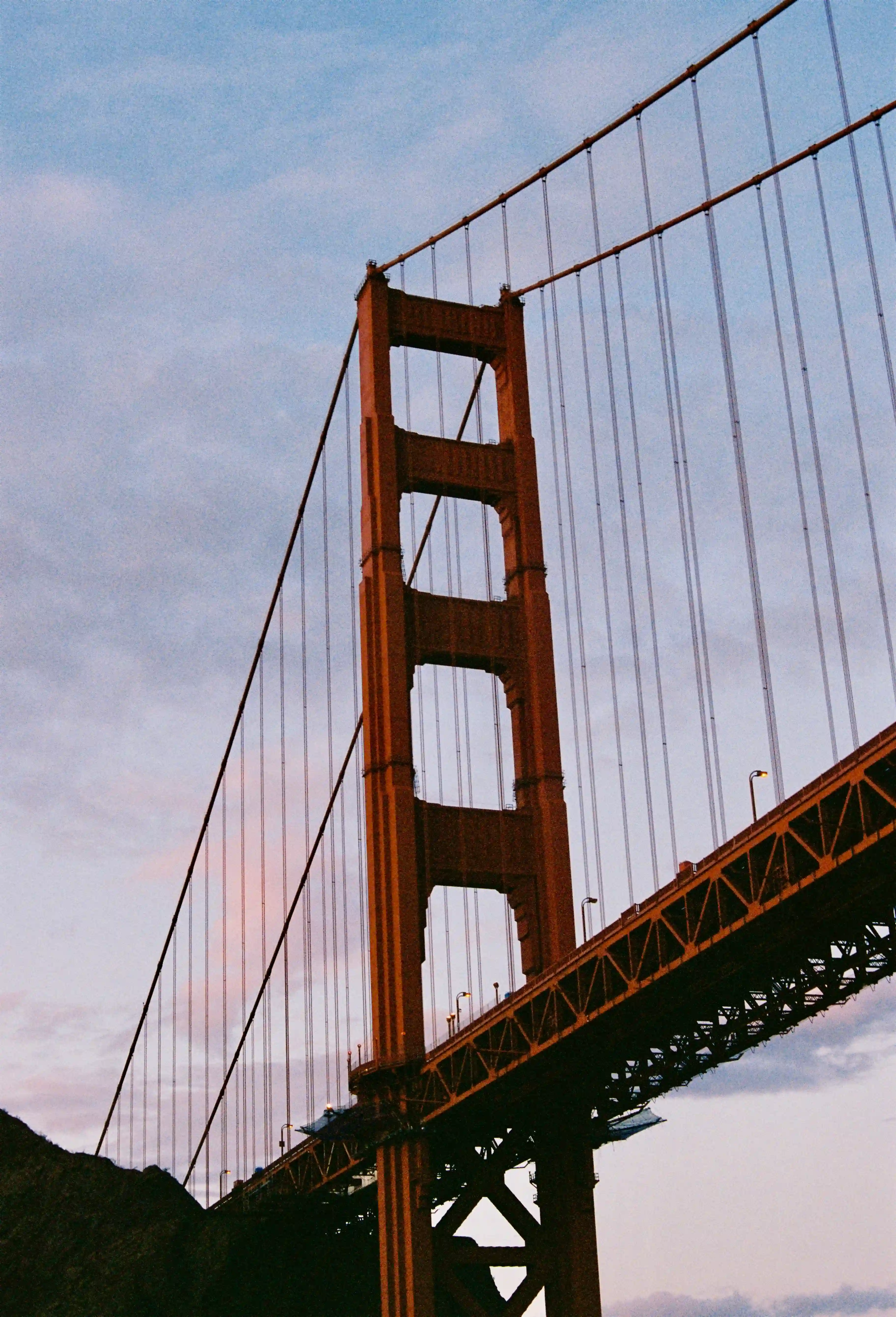 Golden Gate bridge from water red bridge golden hour